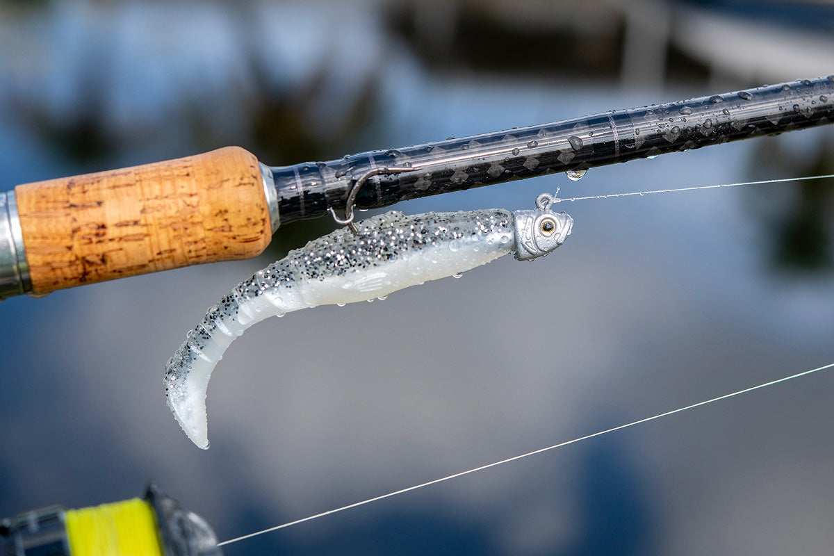 Fishing rod with a lure on a blurred background