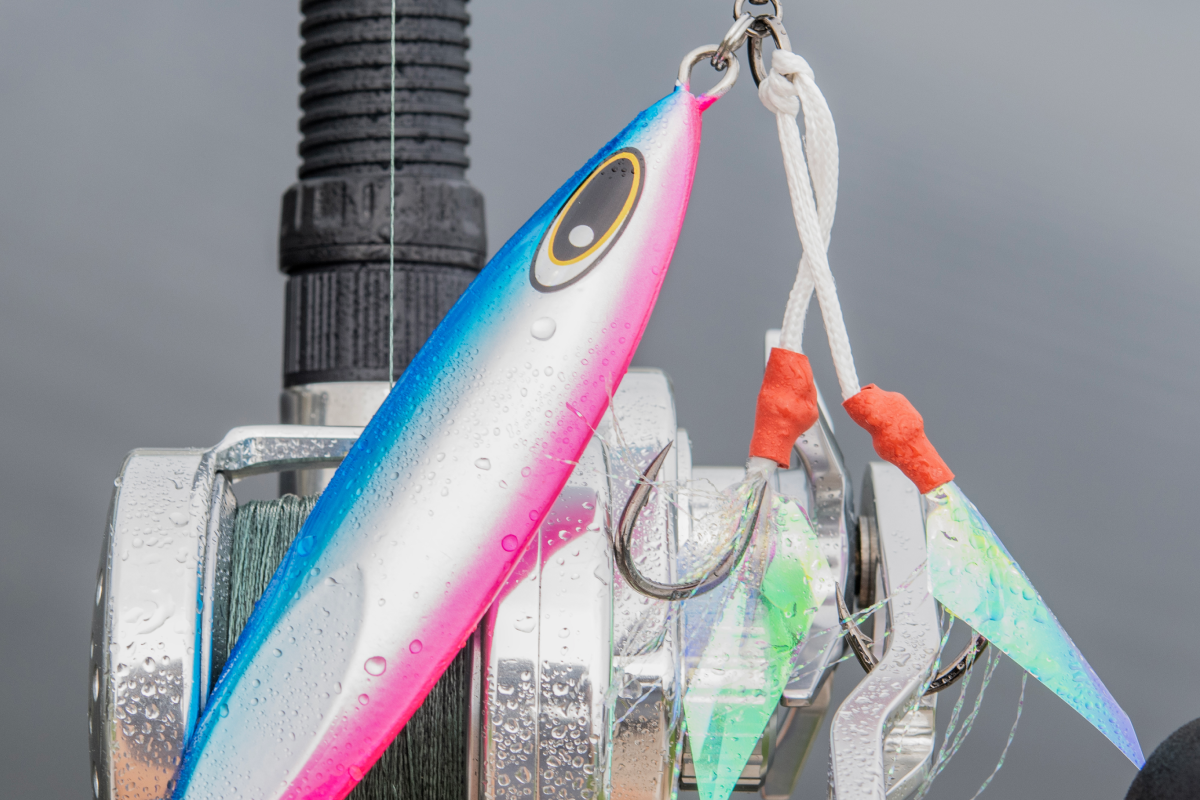 Fishing lure attached to a fishing rod with a blurred background